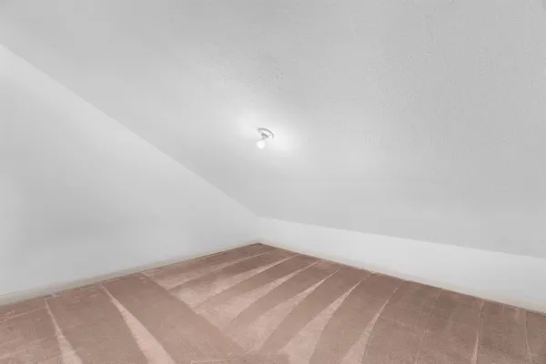 a view of a room with an empty space