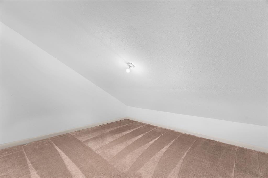 1048 Signal Ridge Place Rockwall, TX 75032 - Photo 28 of 40 a view of a room with an empty space