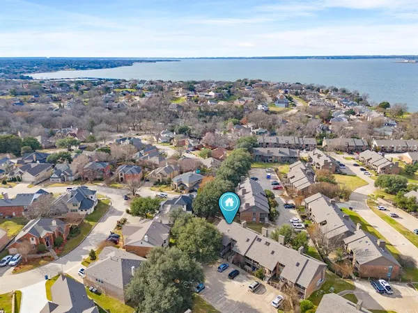 an aerial view of a house with a outdoor space
