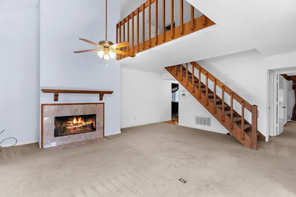 a view of an livingroom with fireplace