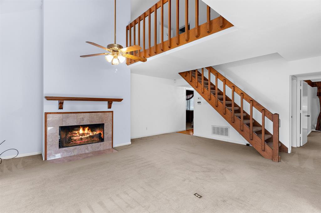1048 Signal Ridge Place Rockwall, TX 75032 - Photo 6 of 40 a view of an livingroom with fireplace