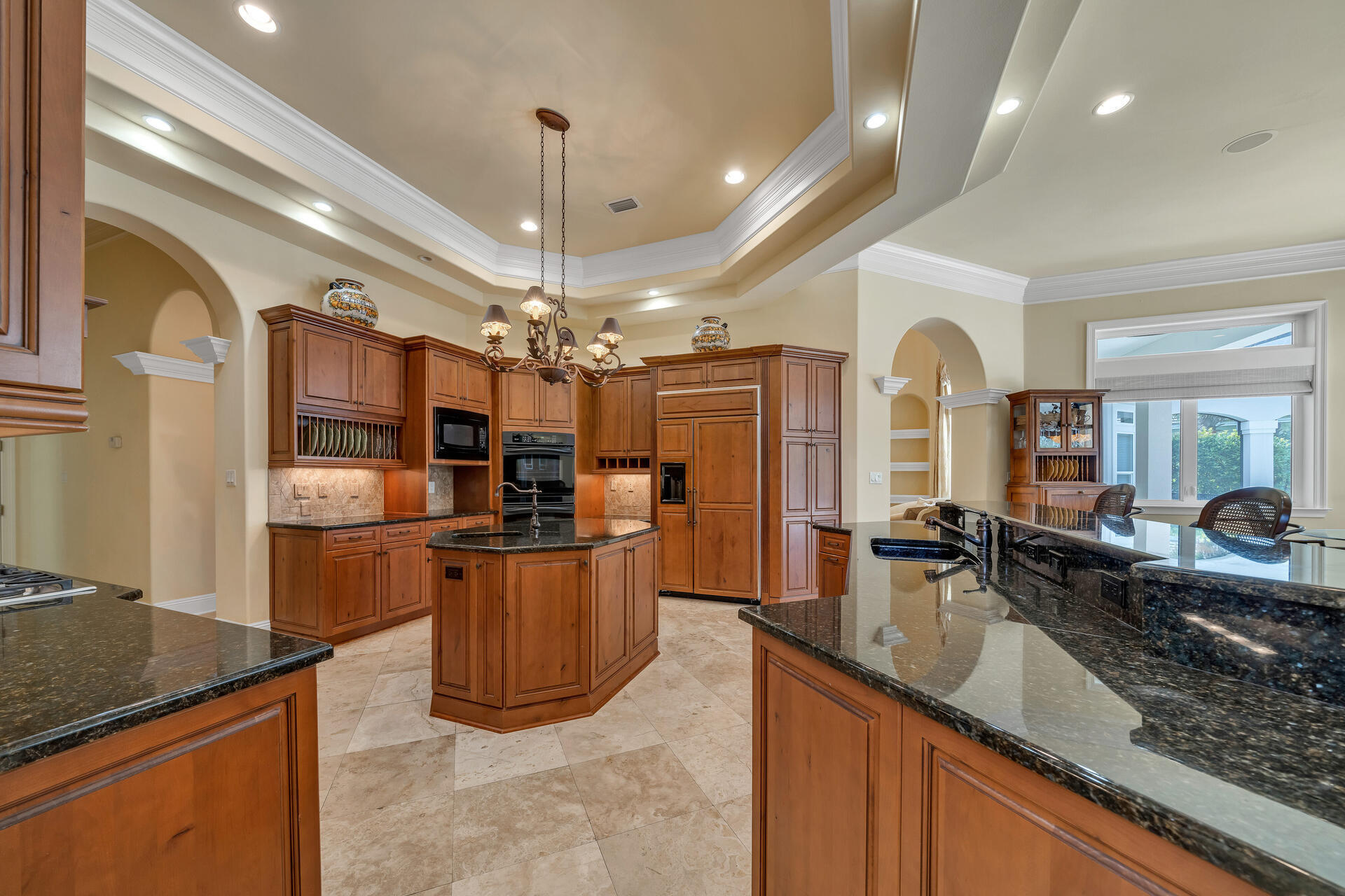 2958 Pine Valley Road Miramar Beach, FL 32550 - Photo 22 of 96 a view of a kitchen with kitchen island a counter top space a sink stainless steel appliances and cabinets