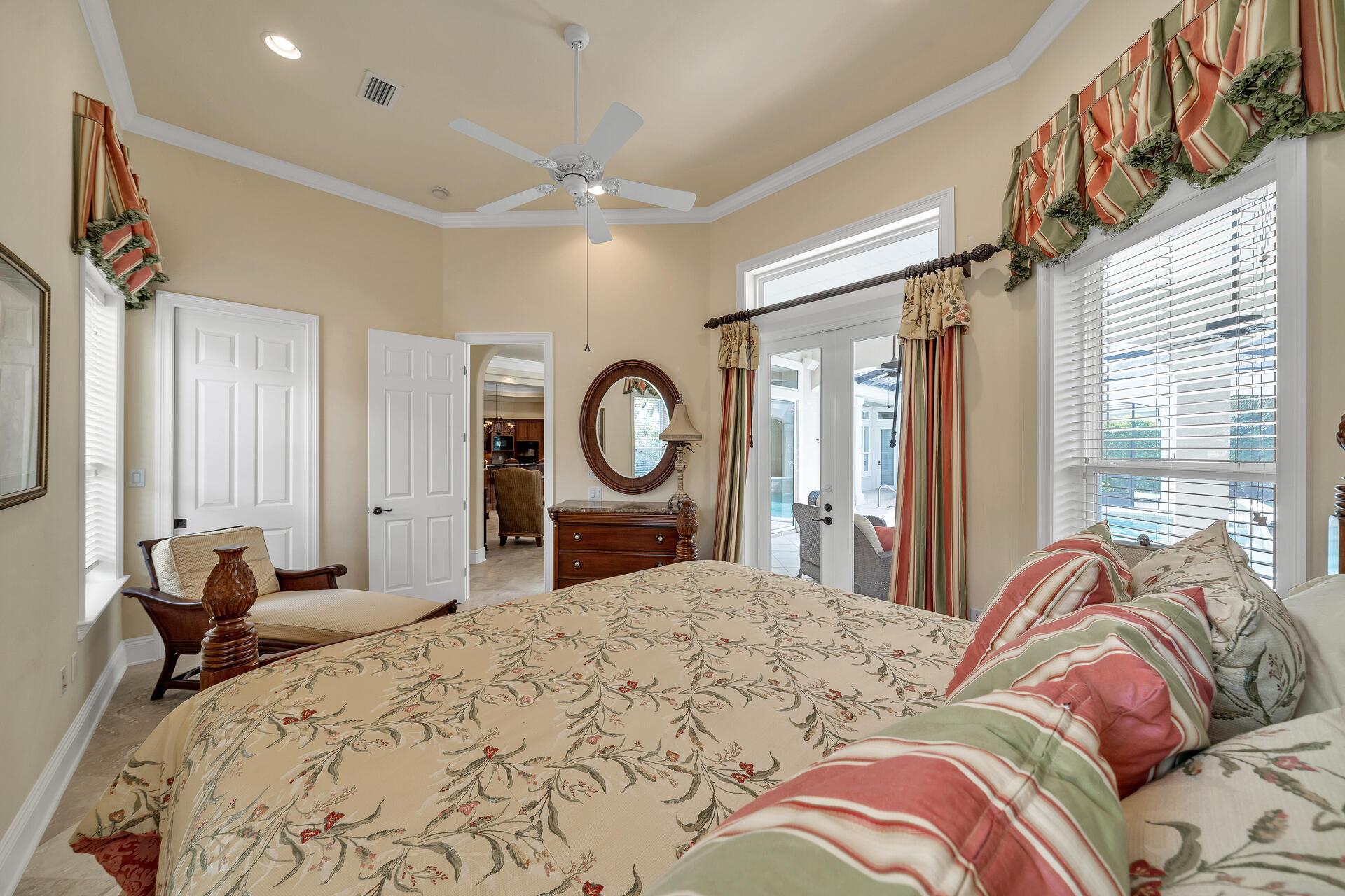 2958 Pine Valley Road Miramar Beach, FL 32550 - Photo 34 of 96 a bedroom with a bed mirror and a large window