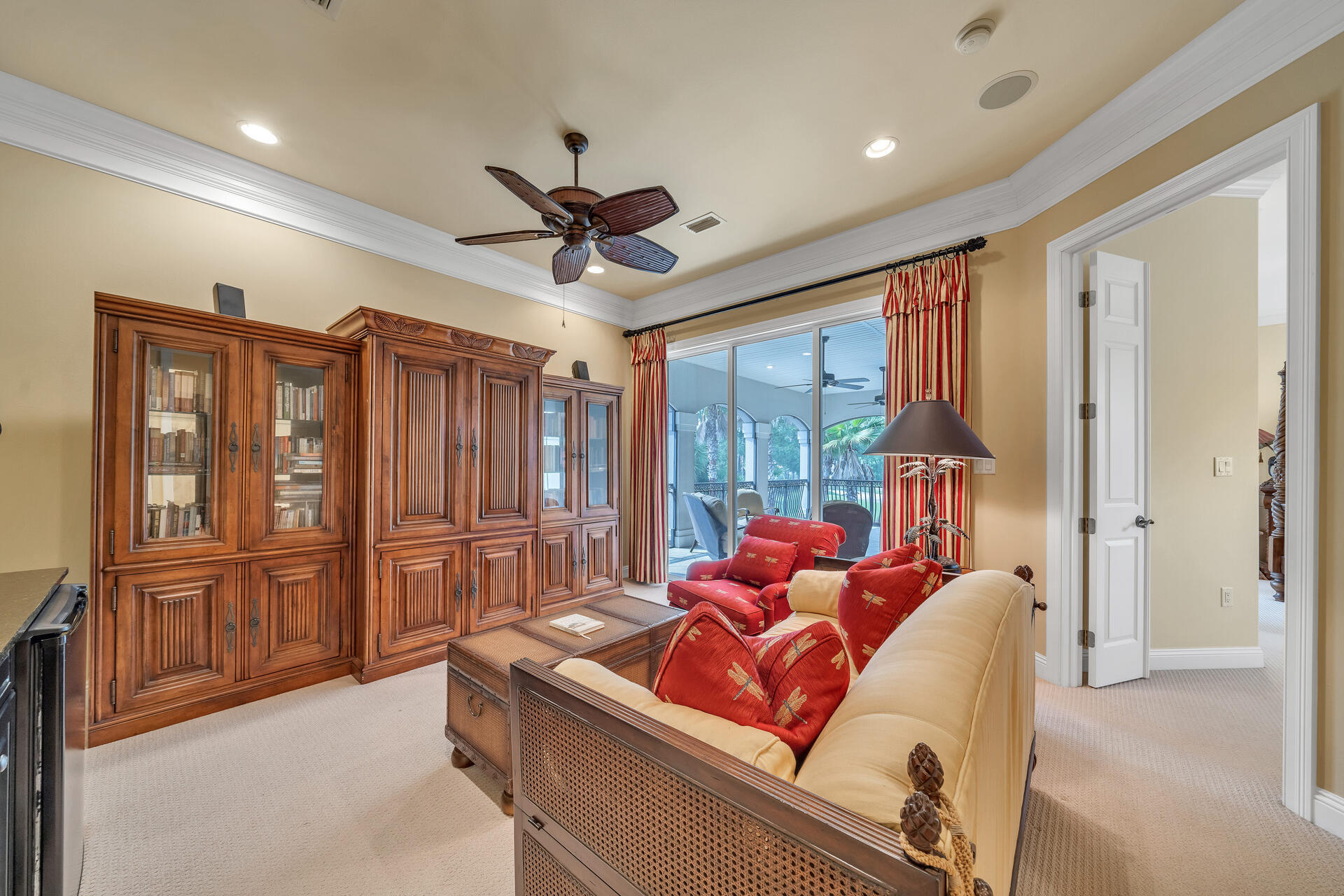 2958 Pine Valley Road Miramar Beach, FL 32550 - Photo 47 of 96 a living room with furniture a ceiling fan hardwood floor and a window