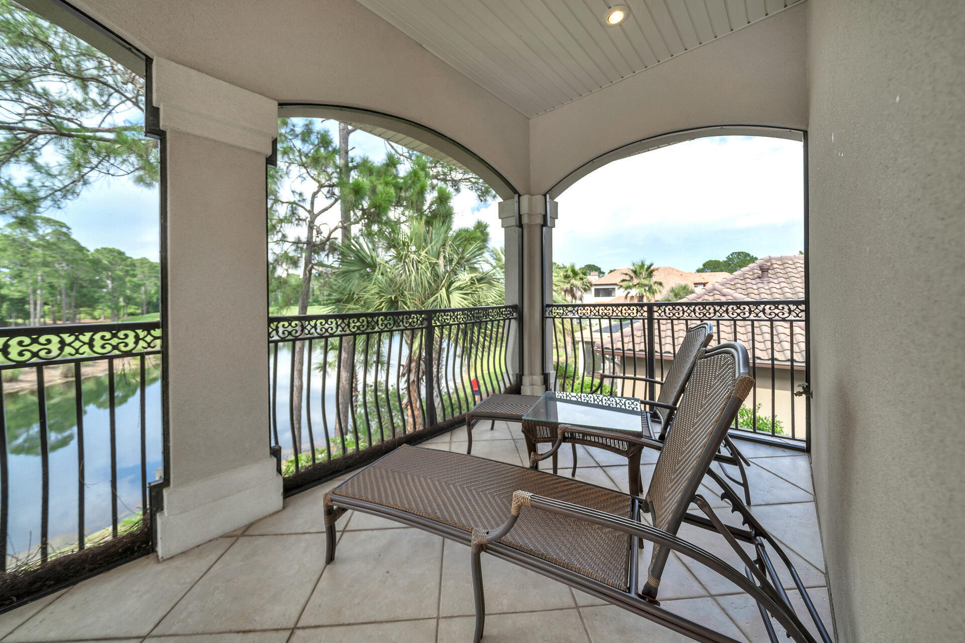 2958 Pine Valley Road Miramar Beach, FL 32550 - Photo 56 of 96 a view of a balcony with chairs and wooden floor