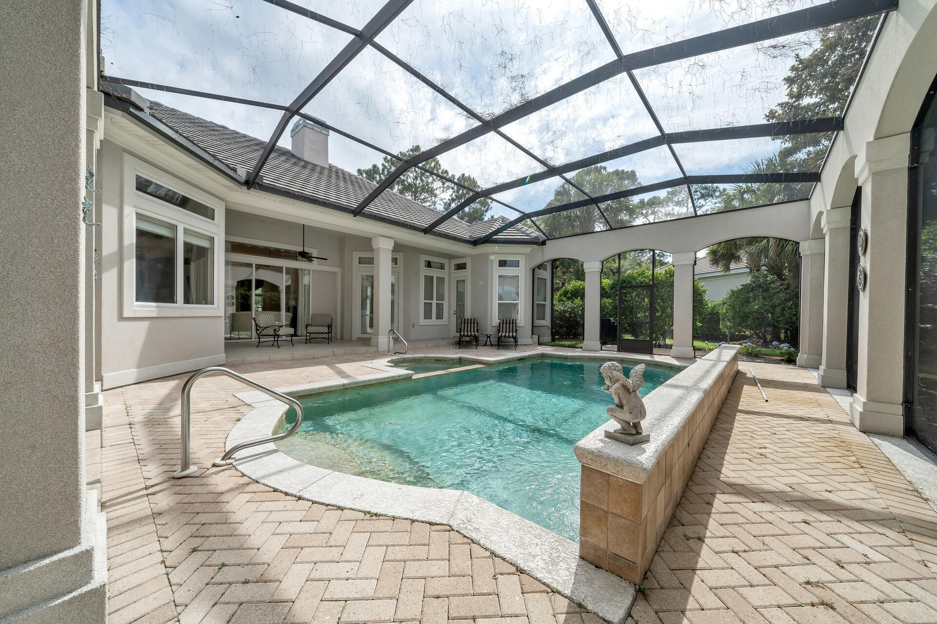 2958 Pine Valley Road Miramar Beach, FL 32550 - Photo 63 of 96 a view of a patio with a dining table and chairs