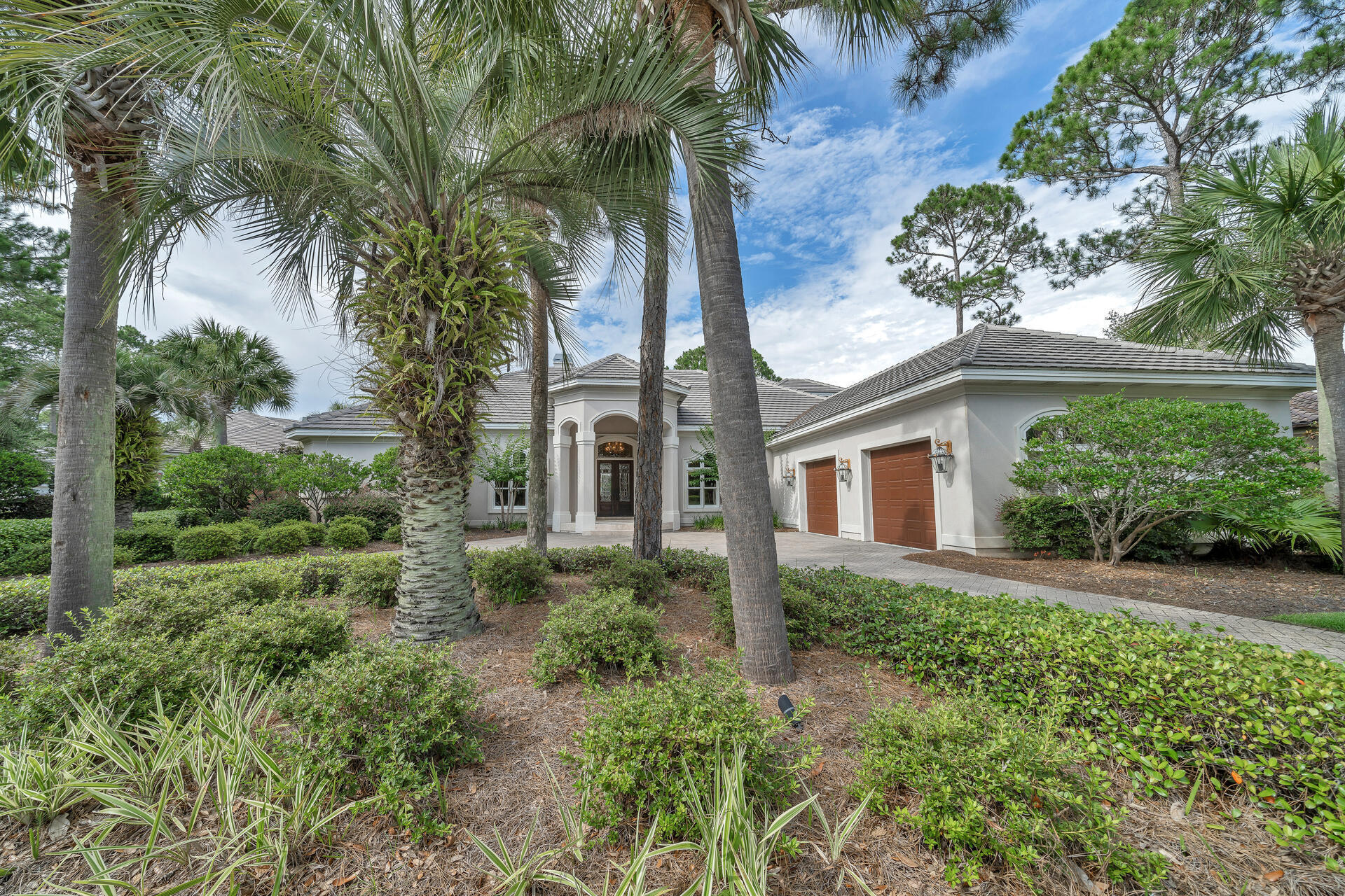 2958 Pine Valley Road Miramar Beach, FL 32550 - Photo 76 of 96 a view of a yard in front of a house with a large tree