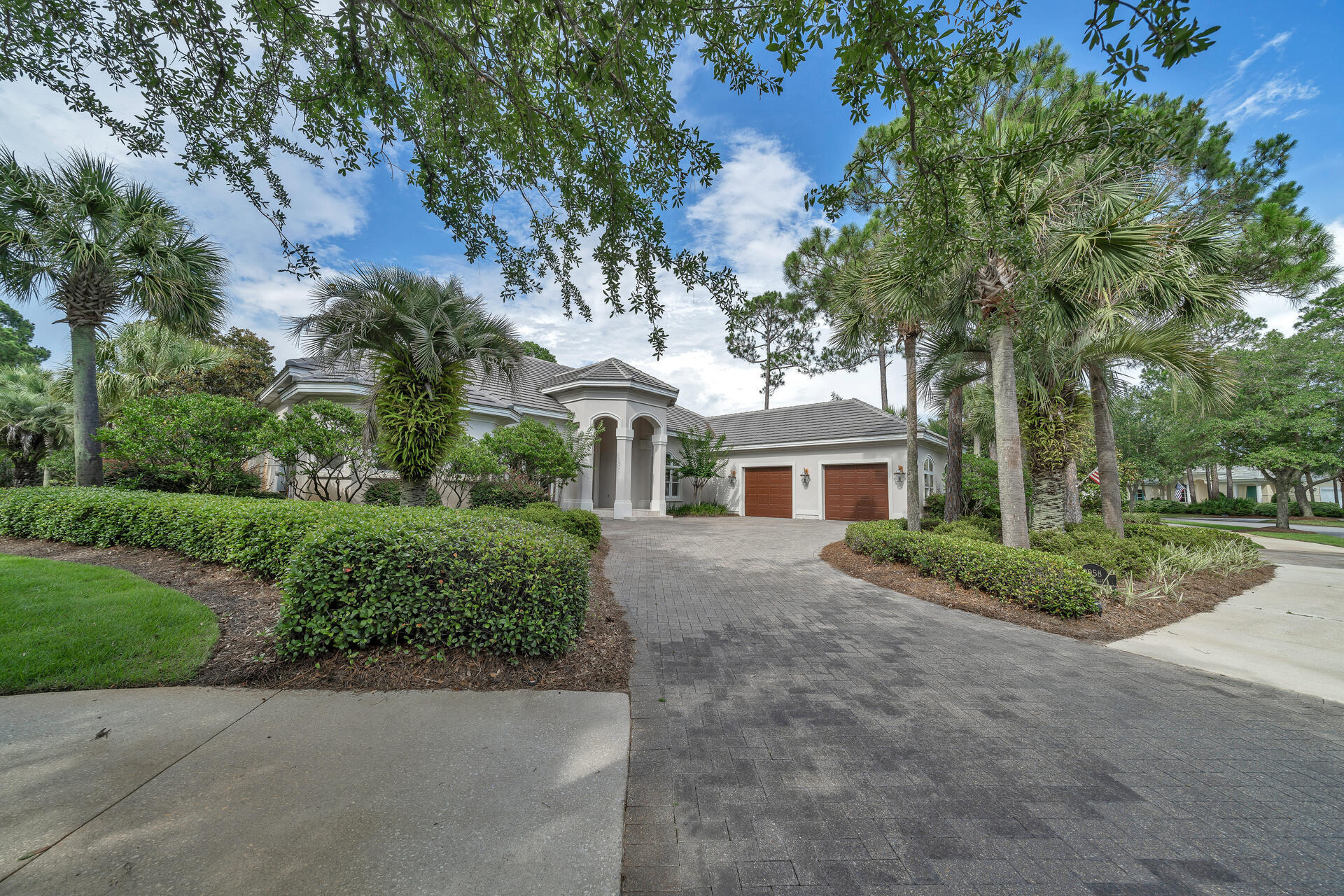 2958 Pine Valley Road Miramar Beach, FL 32550 - Photo 79 of 96 front view of a house with a garden