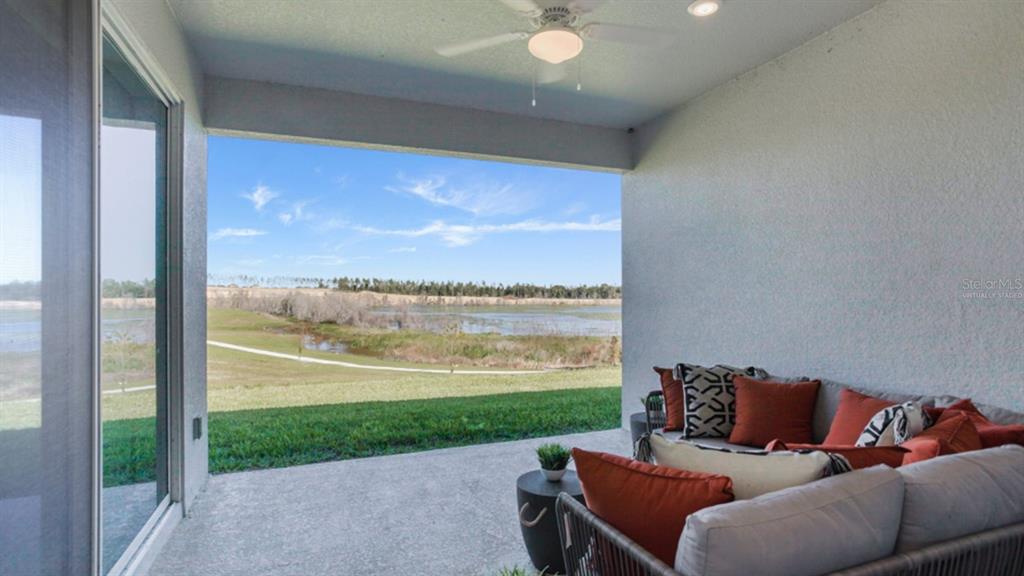 1696 Rider Rain Lane Apopka, FL 32703 - Photo 11 of 19 a outdoor living space with furniture