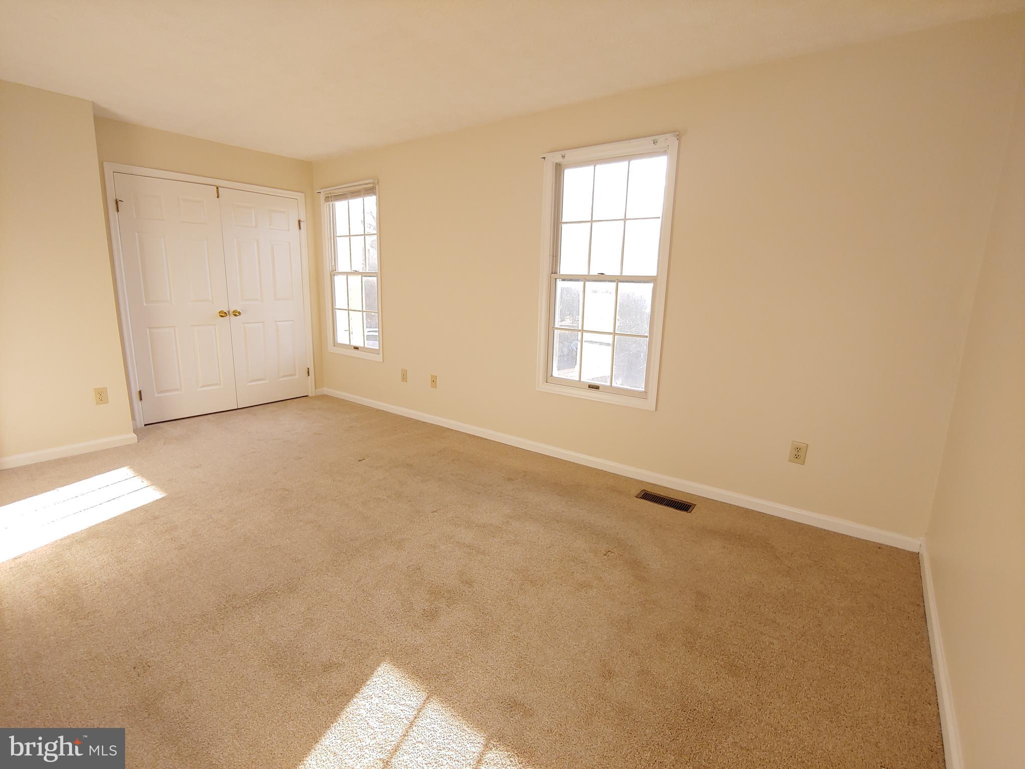 2134 Commissary Circle Odenton, MD 21113 - Photo 11 of 41 an empty room with windows