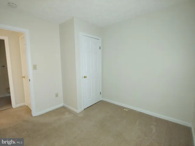 an empty room with closet