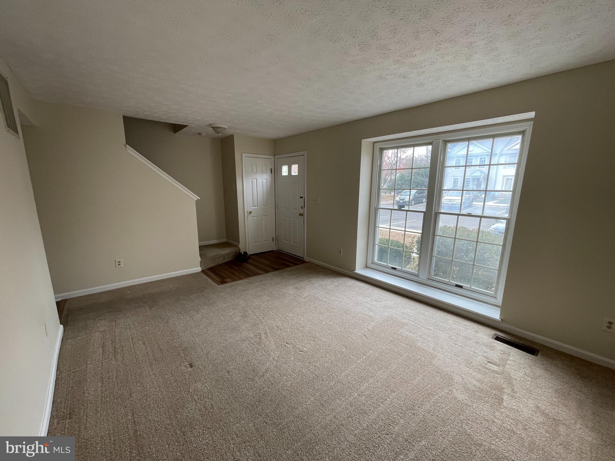 2134 Commissary Circle Odenton, MD 21113 - Photo 2 of 41 a view of an empty room with a window