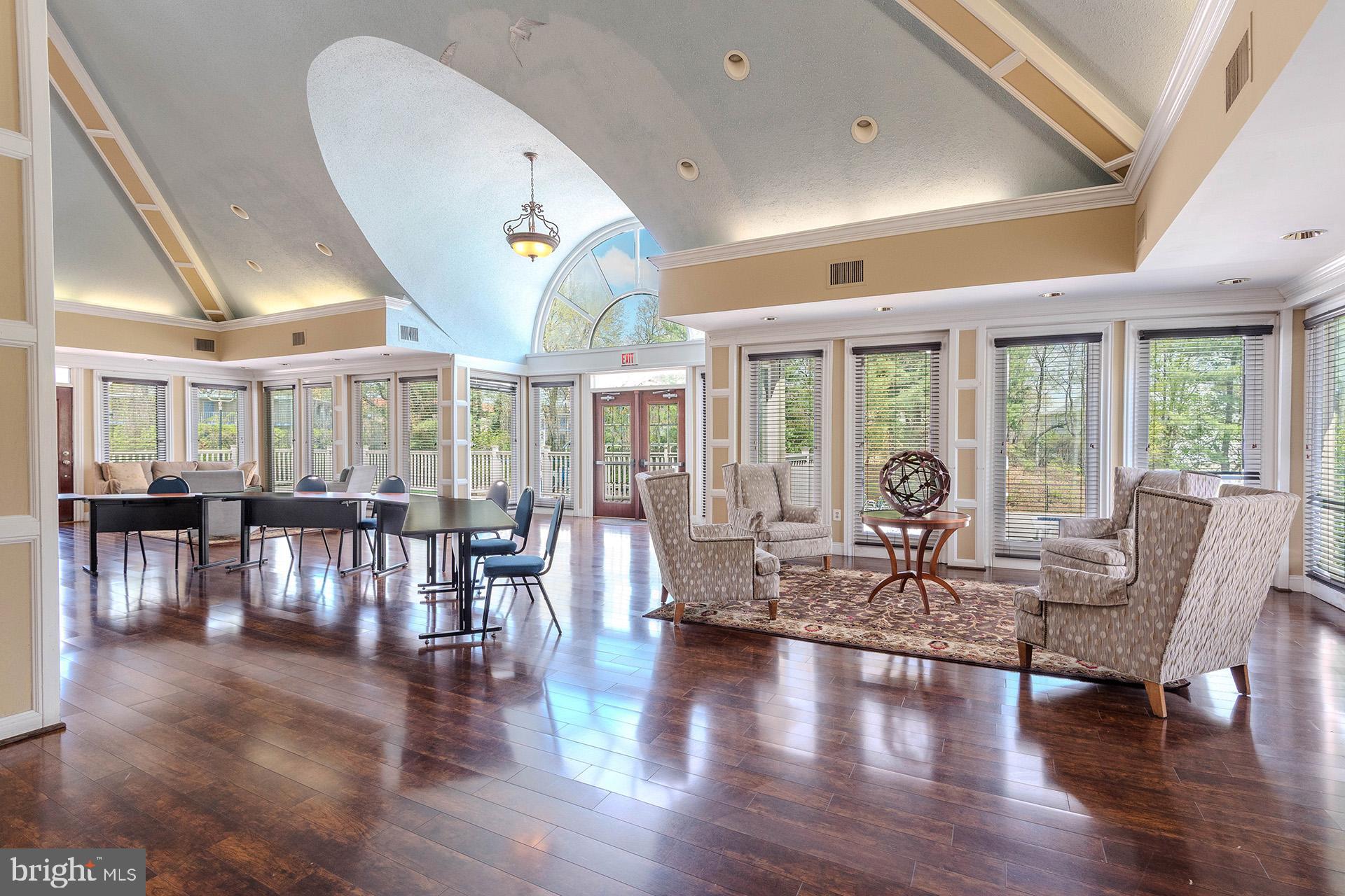 2134 Commissary Circle Odenton, MD 21113 - Photo 26 of 41 a view of a dining room with furniture window and wooden floor