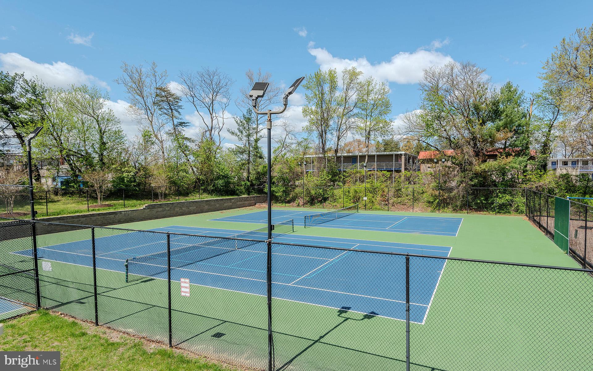 2134 Commissary Circle Odenton, MD 21113 - Photo 32 of 41 a view of a tennis court