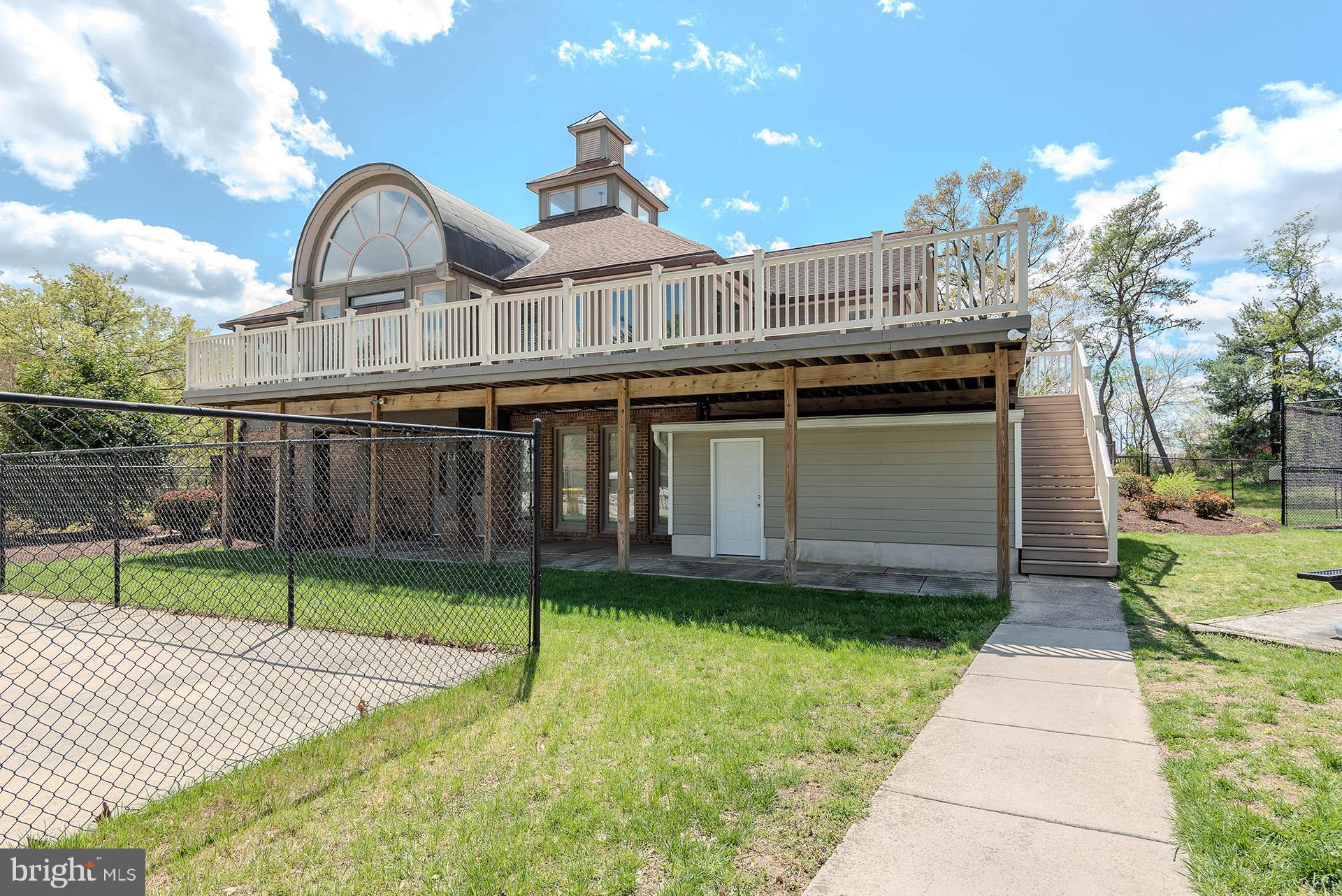2134 Commissary Circle Odenton, MD 21113 - Photo 34 of 41 a view of a house with a yard and plants
