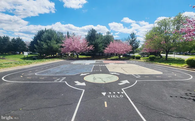 a view of a swimming pool with a sitting area