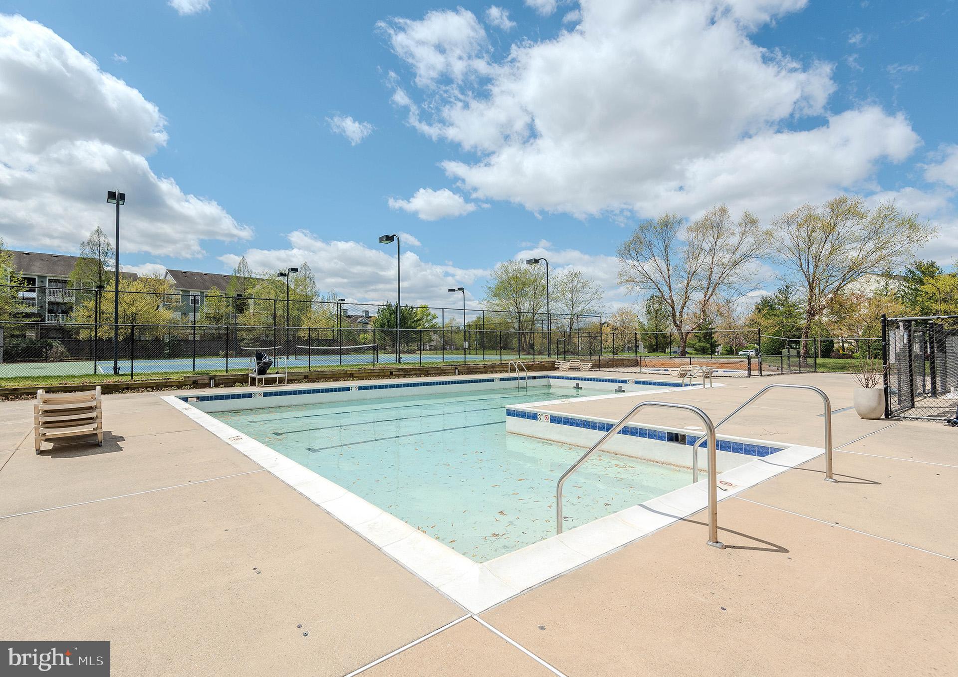2134 Commissary Circle Odenton, MD 21113 - Photo 40 of 41 a view of a swimming pool with a sitting area
