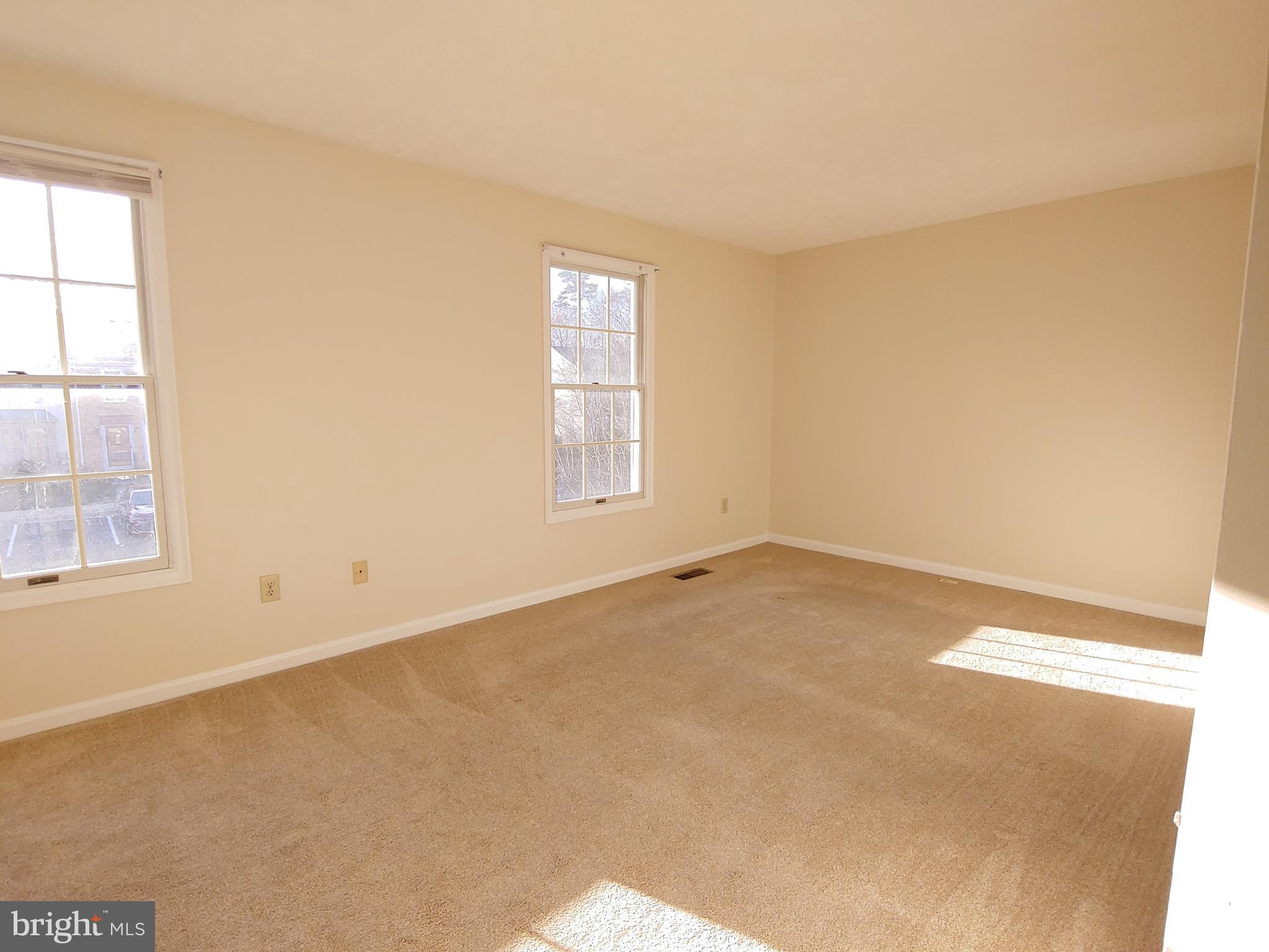 2134 Commissary Circle Odenton, MD 21113 - Photo 8 of 41 an empty room with windows