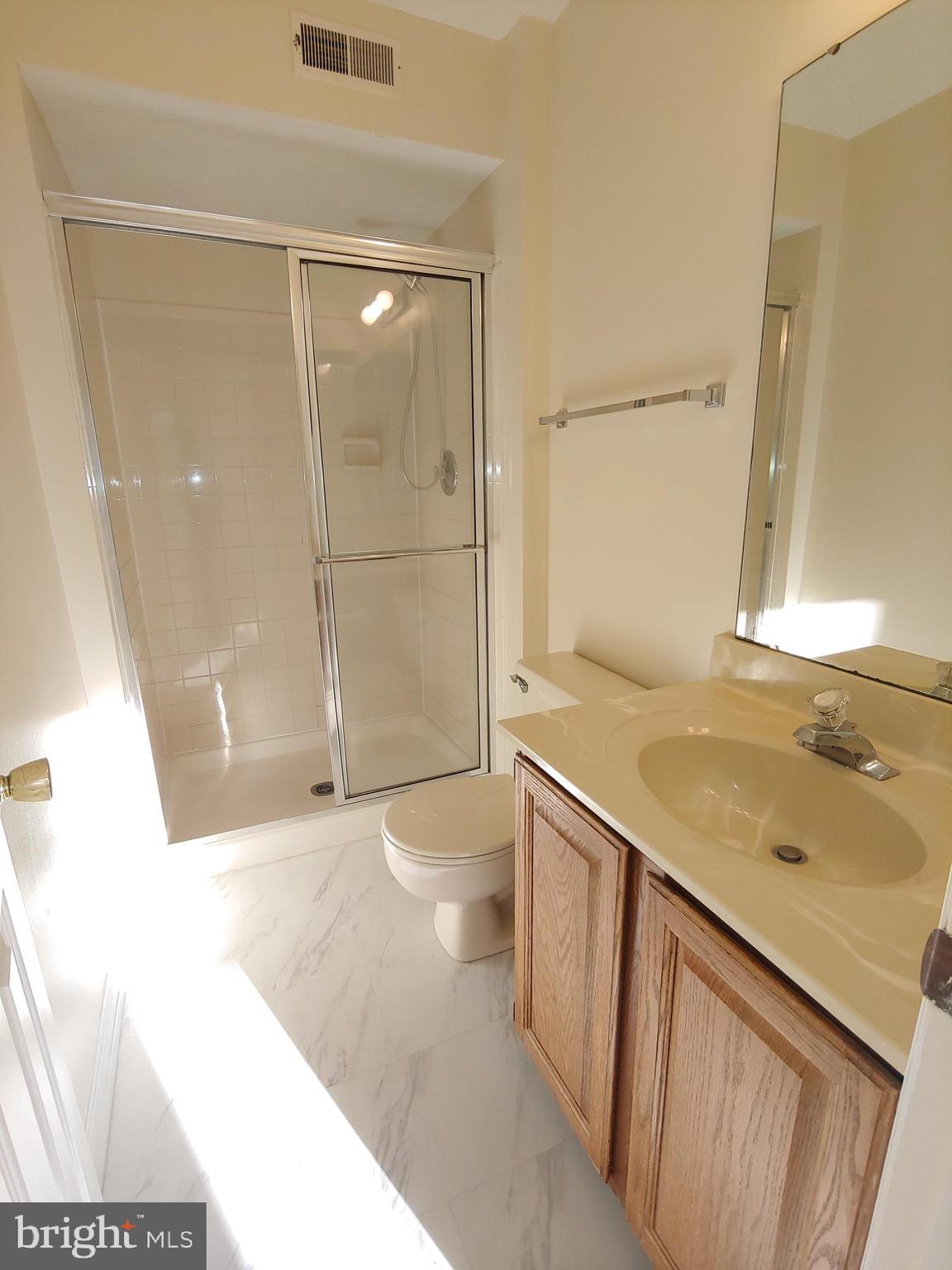 2134 Commissary Circle Odenton, MD 21113 - Photo 10 of 41 a bathroom with a sink and a shower