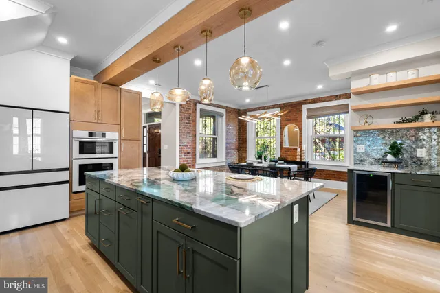 a view of a a dining room with furniture window and outside view