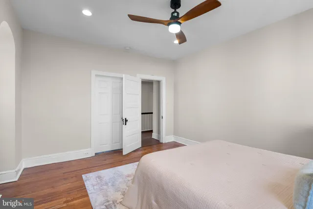 a kitchen with stainless steel appliances kitchen island granite countertop a stove and a sink