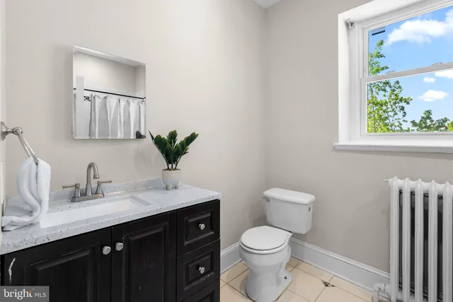 a kitchen with stainless steel appliances a stove and a sink