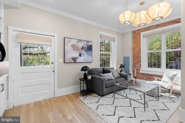 a large kitchen with a large counter top appliances and cabinets