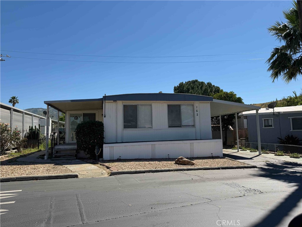 2751 South Reche Canyon Road, Unit 162 Colton, CA 92324 - Photo 2 of 11 a front view of a house