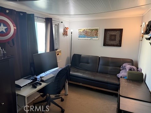 2751 South Reche Canyon Road, Unit 162 Colton, CA 92324 - Photo 6 of 11 a living room with furniture and a window
