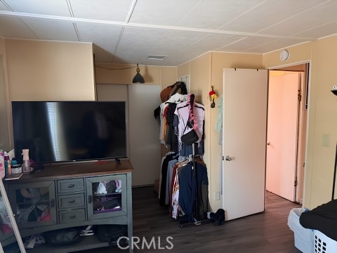 2751 South Reche Canyon Road, Unit 162 Colton, CA 92324 - Photo 8 of 11 a living room with furniture and a flat screen tv