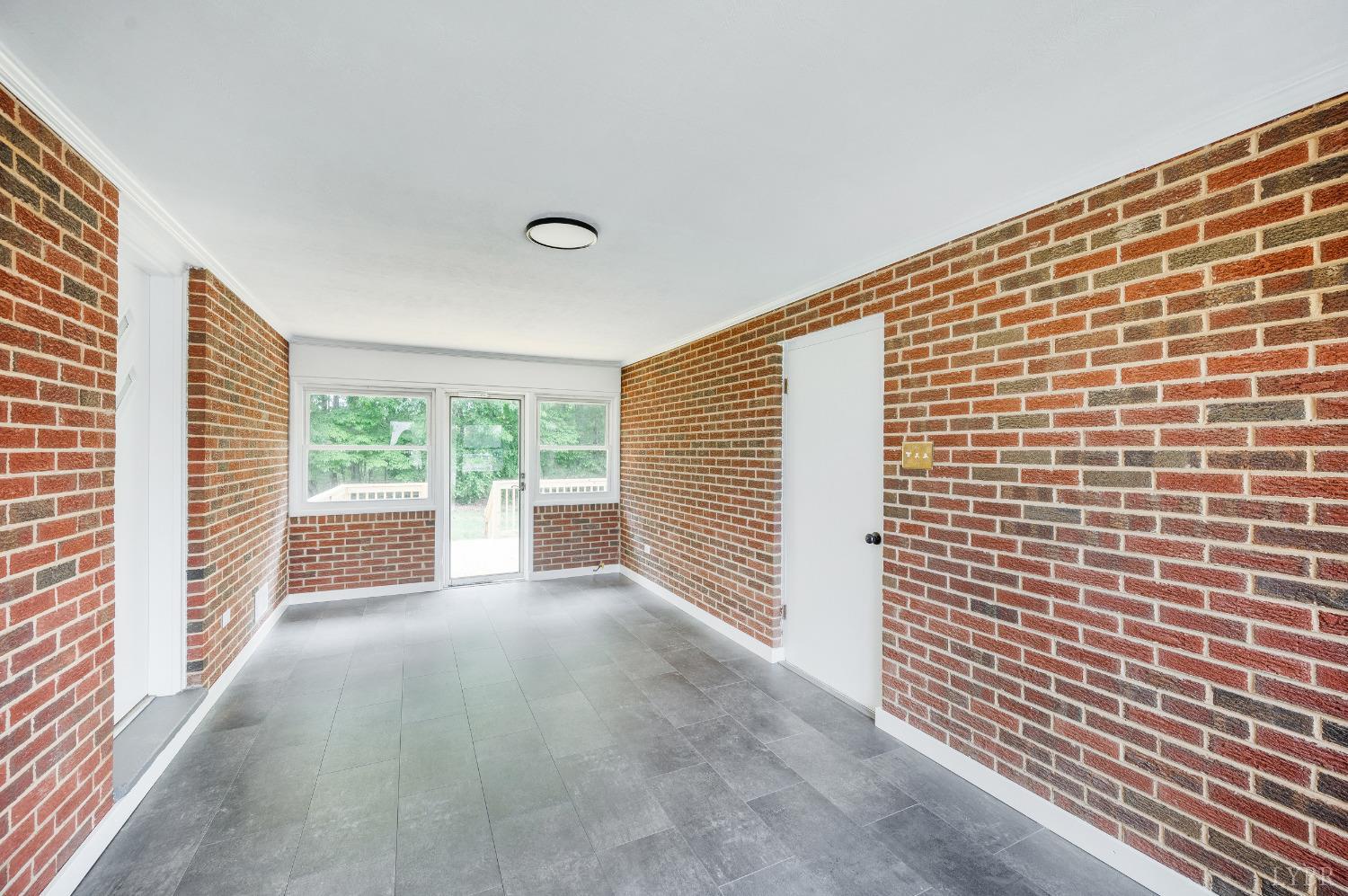 7230 Wards Road Rustburg, VA 24588 - Photo 23 of 58 a view of a room with a large window
