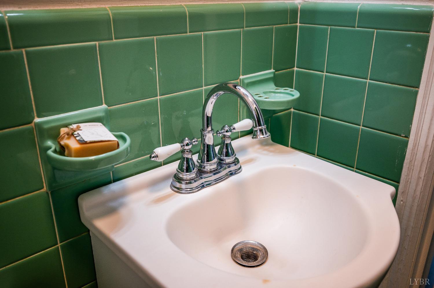 7230 Wards Road Rustburg, VA 24588 - Photo 31 of 58 a bathroom with a sink and toilet