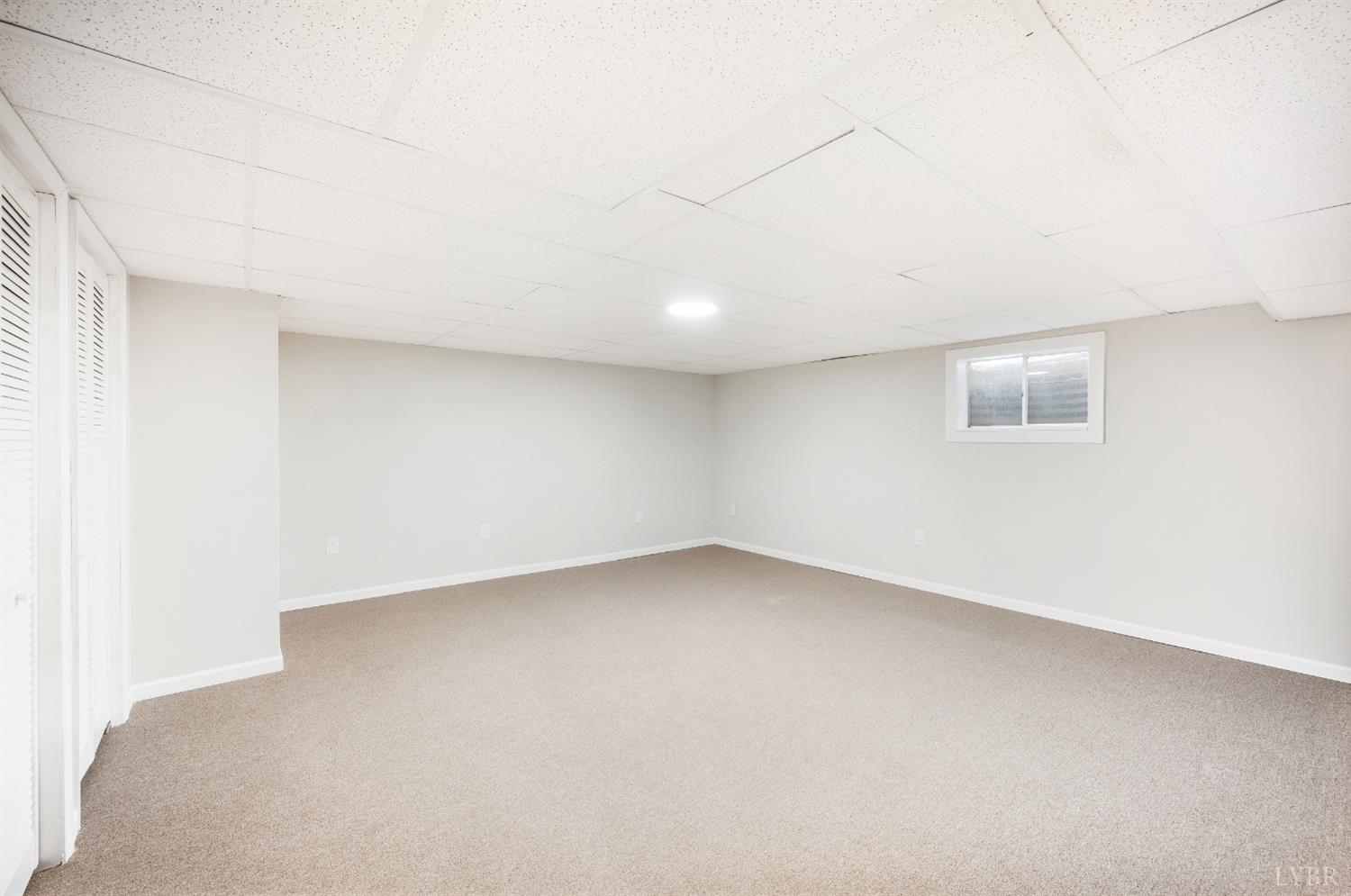 7230 Wards Road Rustburg, VA 24588 - Photo 40 of 58 an empty room with a empty space and a window