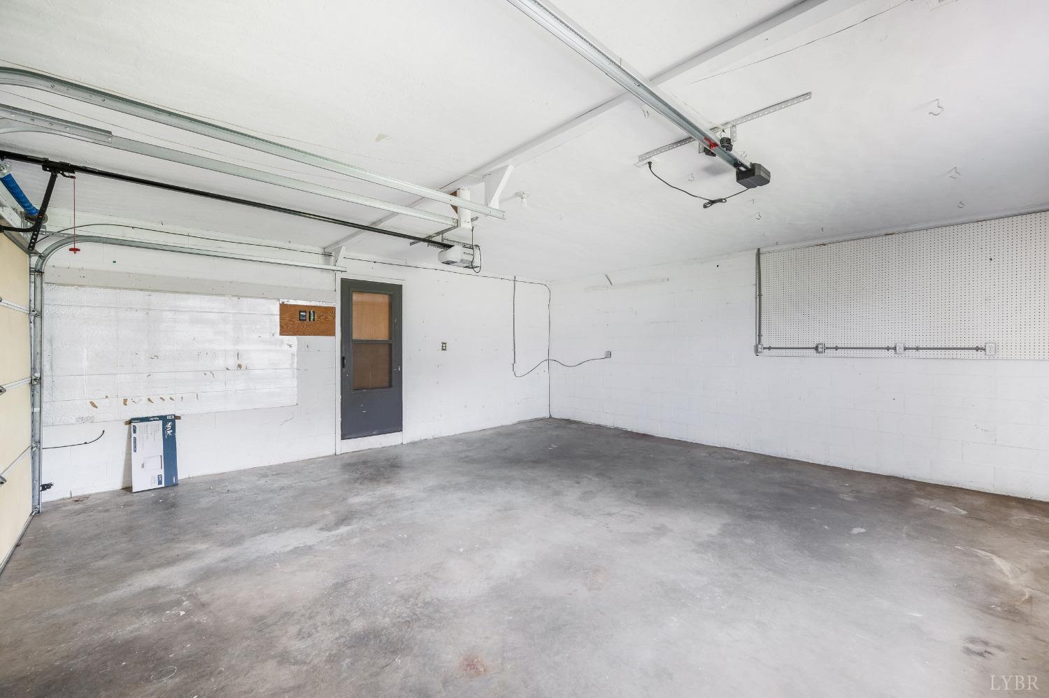7230 Wards Road Rustburg, VA 24588 - Photo 49 of 58 an empty room with a empty space and windows