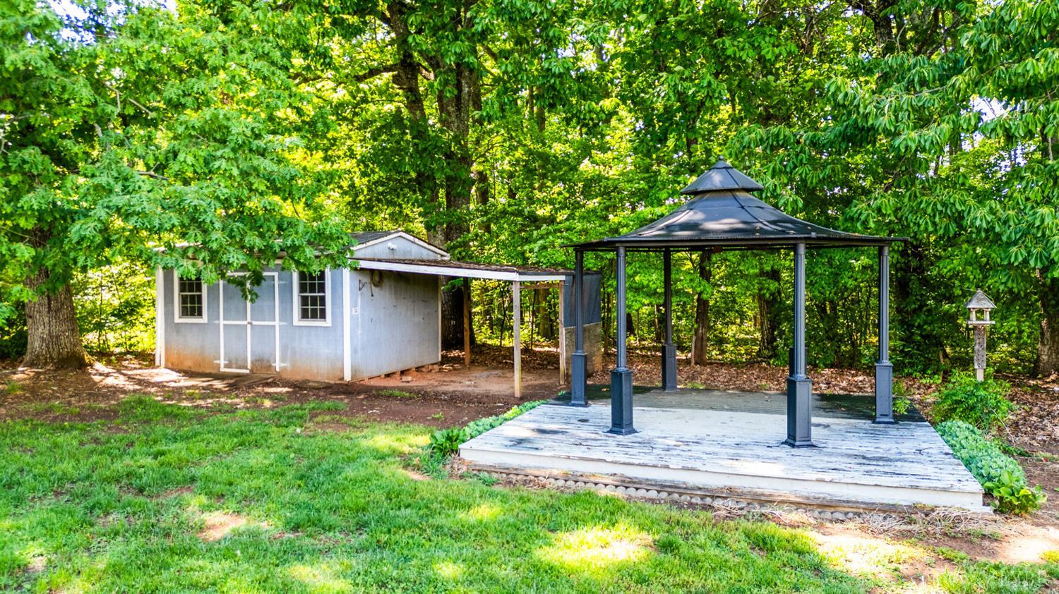 7230 Wards Road Rustburg, VA 24588 - Photo 53 of 58 a front view of a house with garden