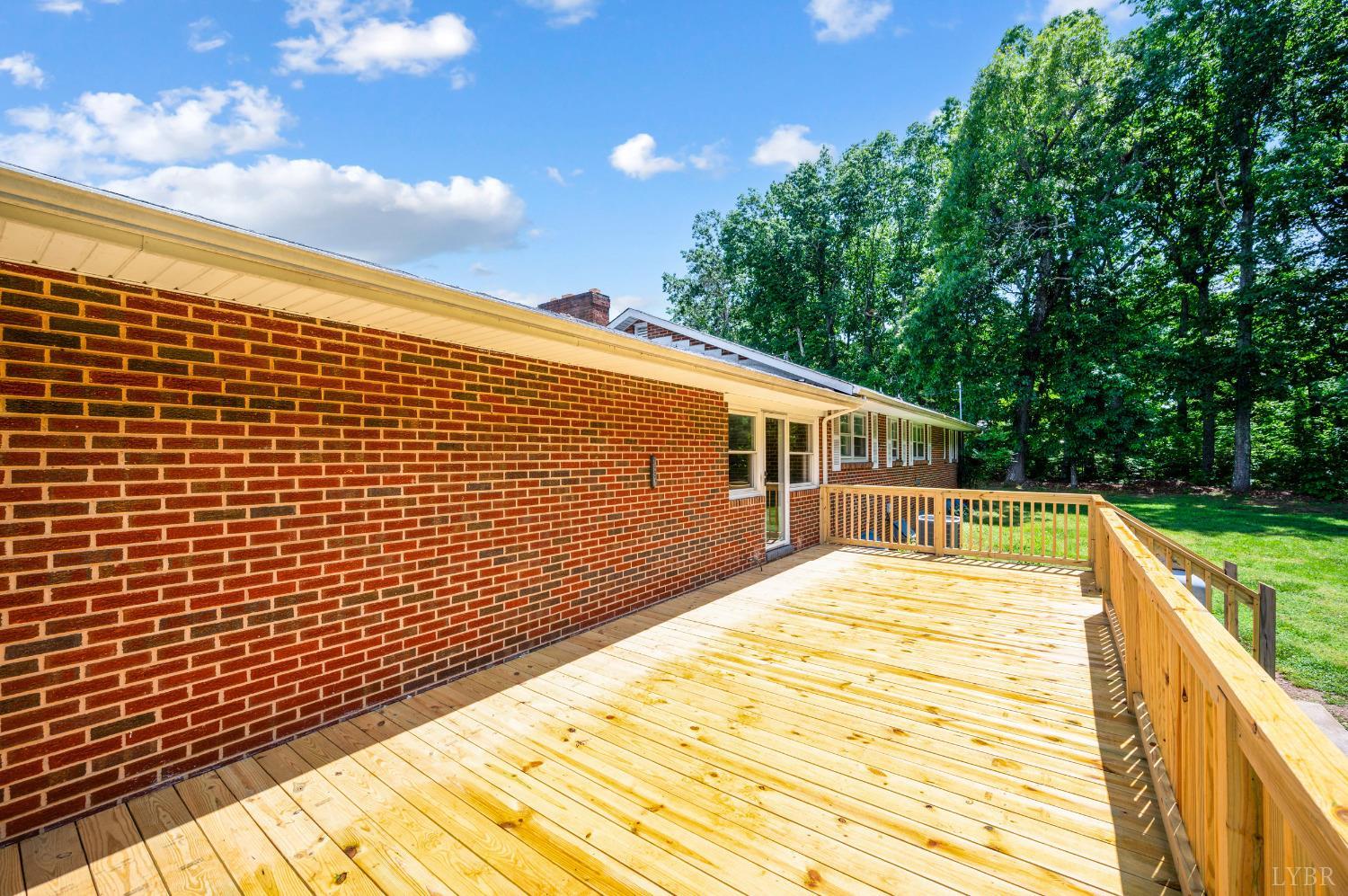 7230 Wards Road Rustburg, VA 24588 - Photo 54 of 58 a view of house with backyard and swimming pool