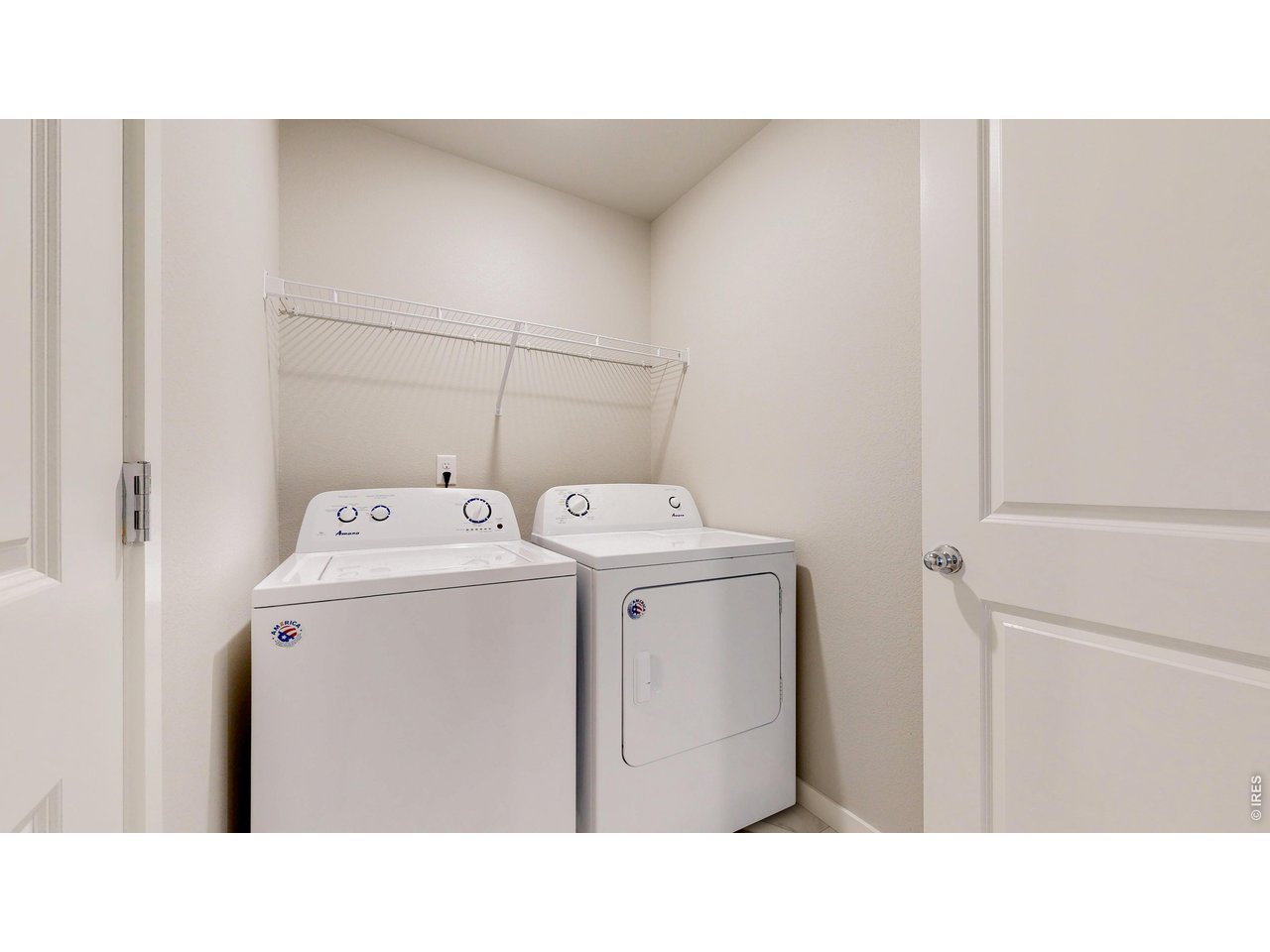 260 Pawnee Road, Unit D3 Ault, CO 80610 - Photo 25 of 44 Upper laundry room with tile floor.