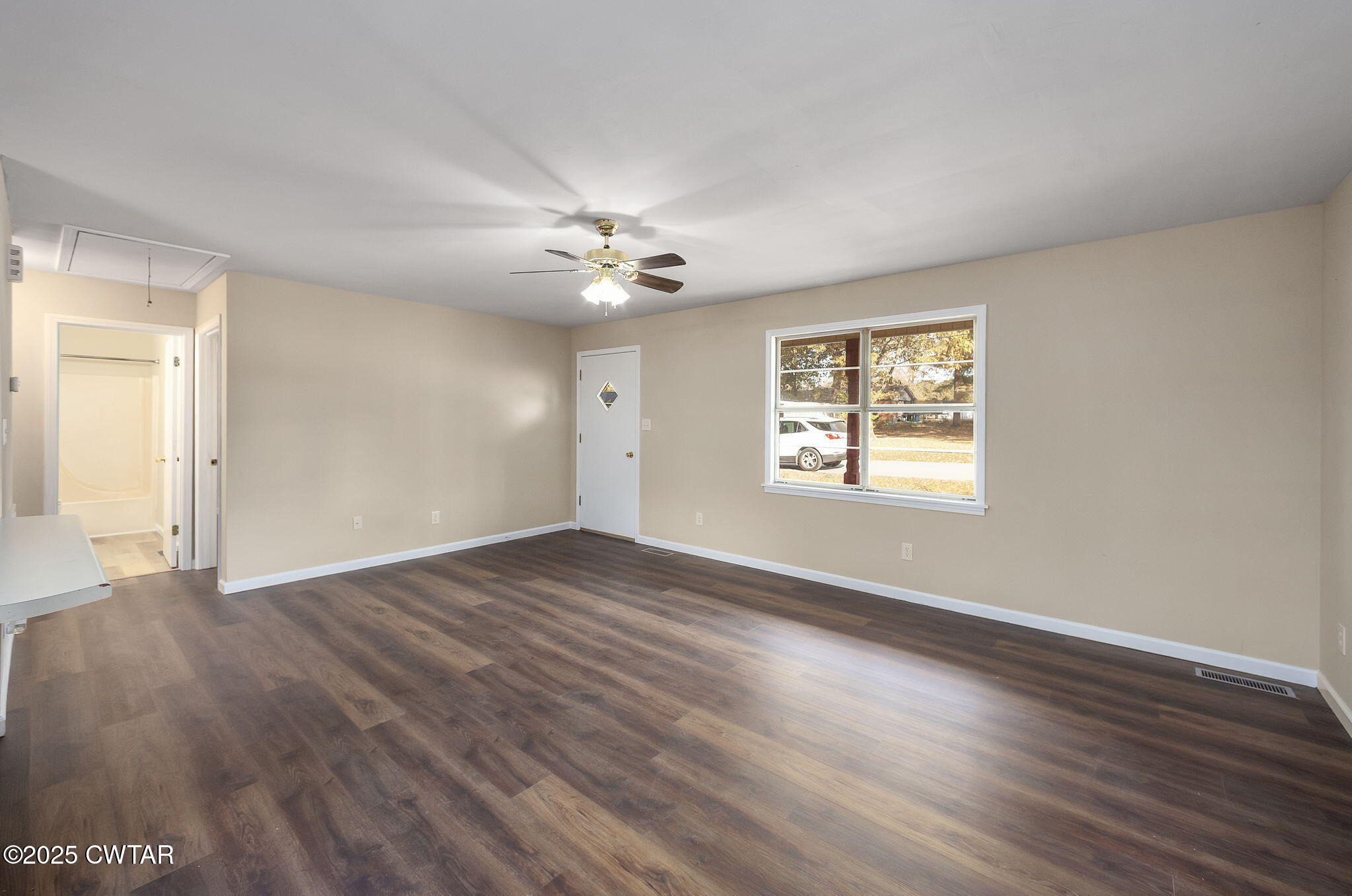 35 Misty Lane Bells, TN 38006 - Photo 10 of 23 a view of an empty room with a window and wooden floor