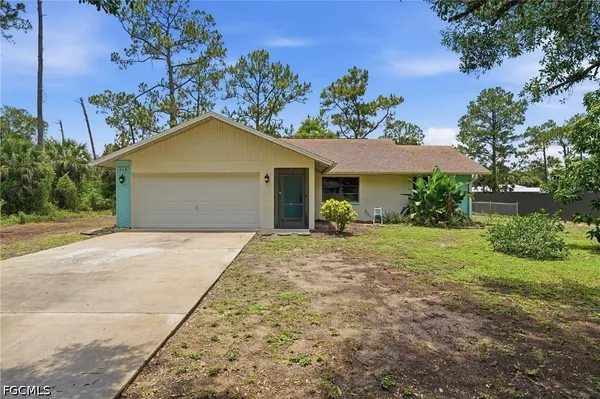 $295,000 | 315 Roosevelt Avenue, Lehigh Acres, FL 33936