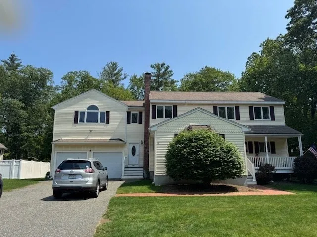 a house view with a garden space