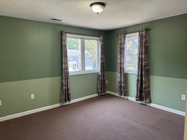14 Moss Street, Unit 2 Burlington, MA 01803 - Photo 13 of 22 an empty room with windows