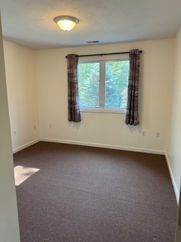 14 Moss Street, Unit 2 Burlington, MA 01803 - Photo 15 of 22 an empty room with a window