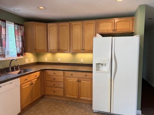 14 Moss Street, Unit 2 Burlington, MA 01803 - Photo 7 of 22 a kitchen with appliances cabinets and a sink