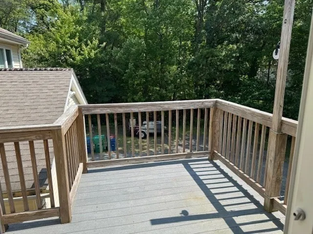 a view of deck with a large window