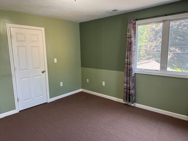14 Moss Street, Unit 2 Burlington, MA 01803 - Photo 10 of 22 an empty room with a window