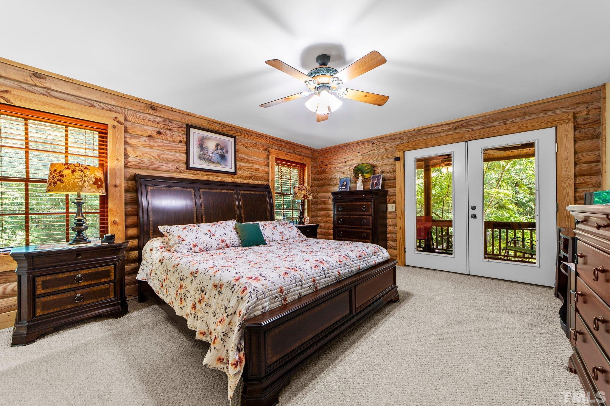 4127 Hidden View Road Mebane, NC 27302 - Photo 18 of 43 With door to porch overlooking pond.