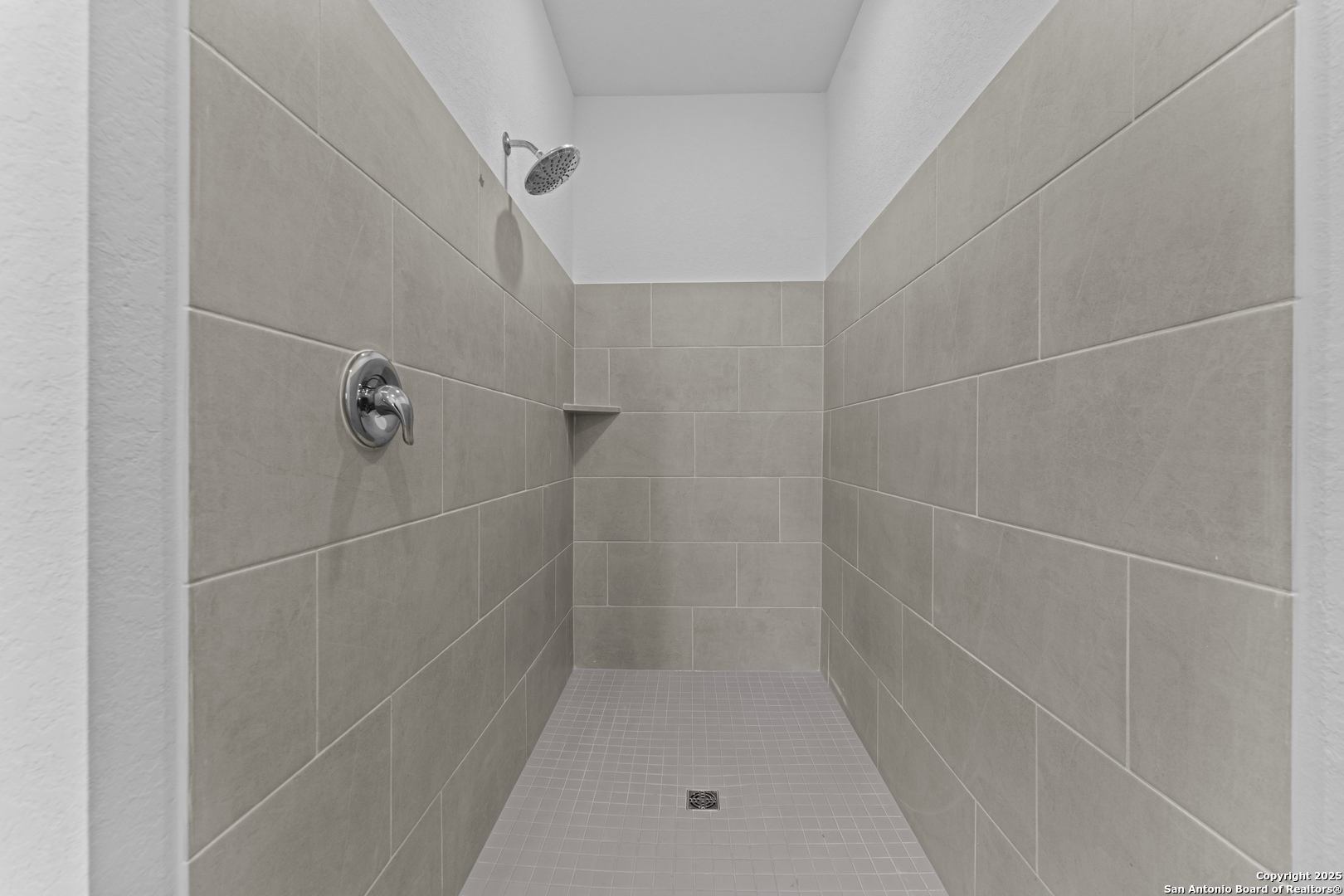 14926 Taradeau San Antonio, TX 78254 - Photo 12 of 25 a bathroom with a shower