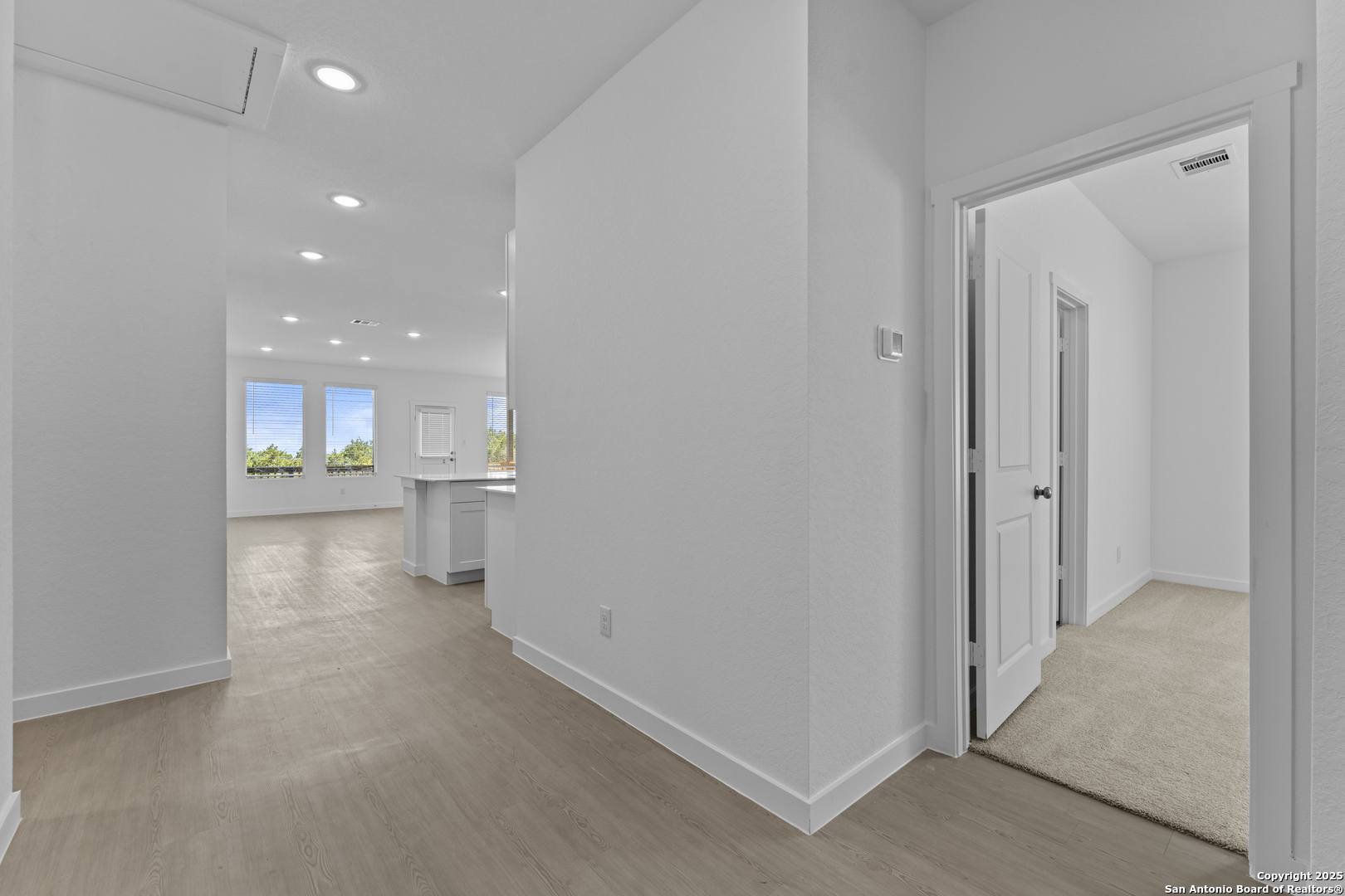 14926 Taradeau San Antonio, TX 78254 - Photo 21 of 25 a view of a hallway and a kitchen