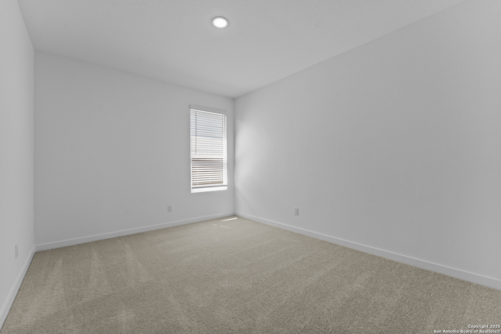 14926 Taradeau San Antonio, TX 78254 - Photo 22 of 25 a view of an empty room with a window