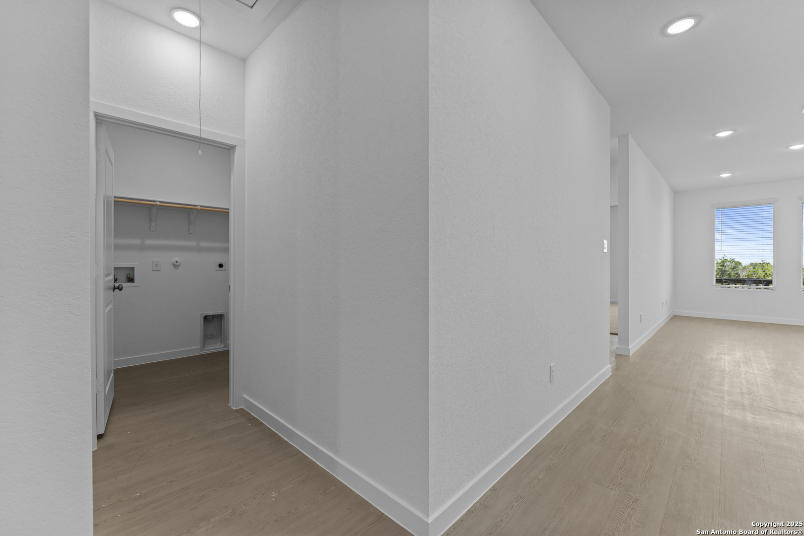 14926 Taradeau San Antonio, TX 78254 - Photo 24 of 25 a view of a hallway with wooden floor